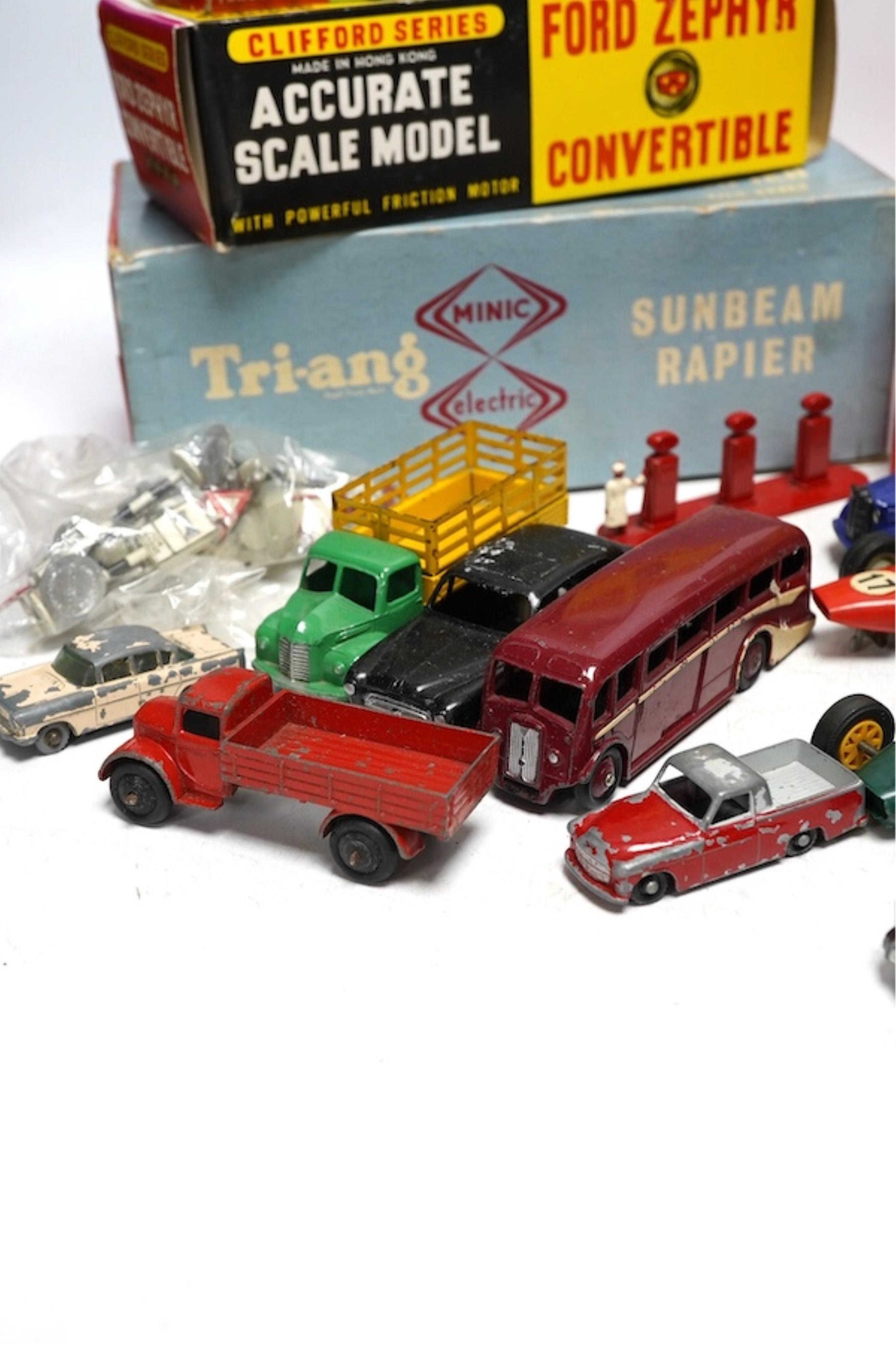 A quantity of diecast vehicles and a few useful boxes including; a boxed Clifford Series Ford Zephyr convertible, two boxed Replicar series Ford Zephyr convertibles, ten unboxed Dinky Toys, two Scalextric Formula One car